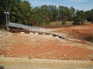 In Atlanta and Athens, Georgia, 2007 was the second driest year on record. Among the numerous effects of the rainfall shortage were restrictions on water use in some cities and low water levels in area lakes. In the photo, a dock lies on dry land near Aqualand Marina on Lake Lanier (located northeast of Atlanta) in December 2007.