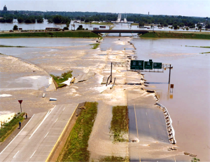 The Great Flood of 1993 caused flooding along 500 miles of the Mississippi and Missouri river systems. The photo shows the flood’s effects on U.S. Highway 54, just north of Jefferson City, Missouri.
